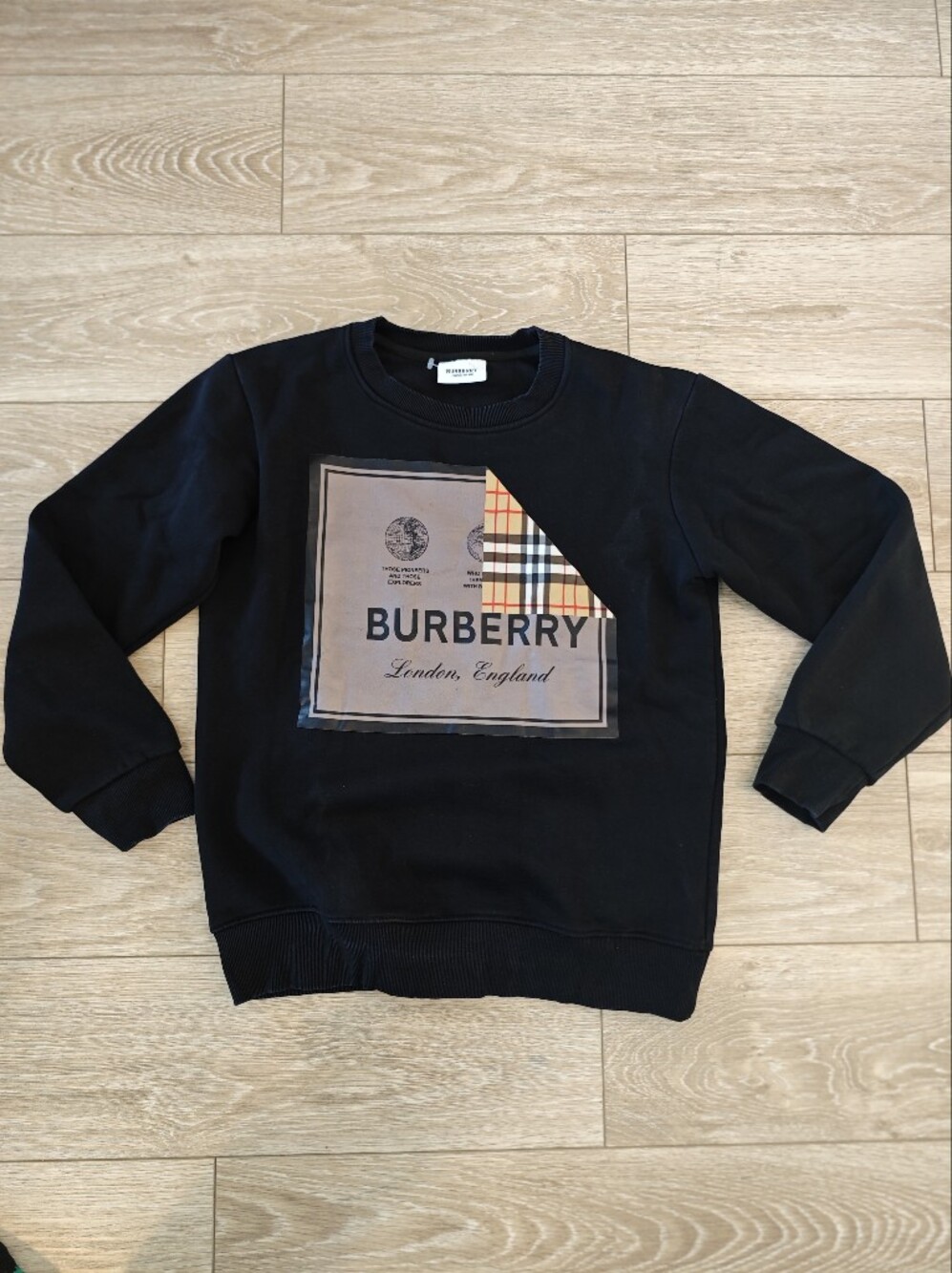 Burberry Black Crewneck Sweater with Beige Check Plaque